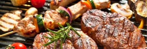 Premium BBQ catering with meats and salads for a wedding reception